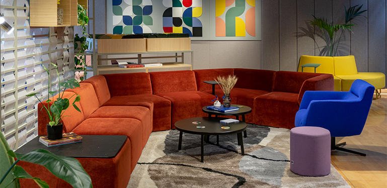 sixteen3's highly sustainable Sedir sofa creates a retro conversation pit with velvet upholstery, in their showroom for CDW23